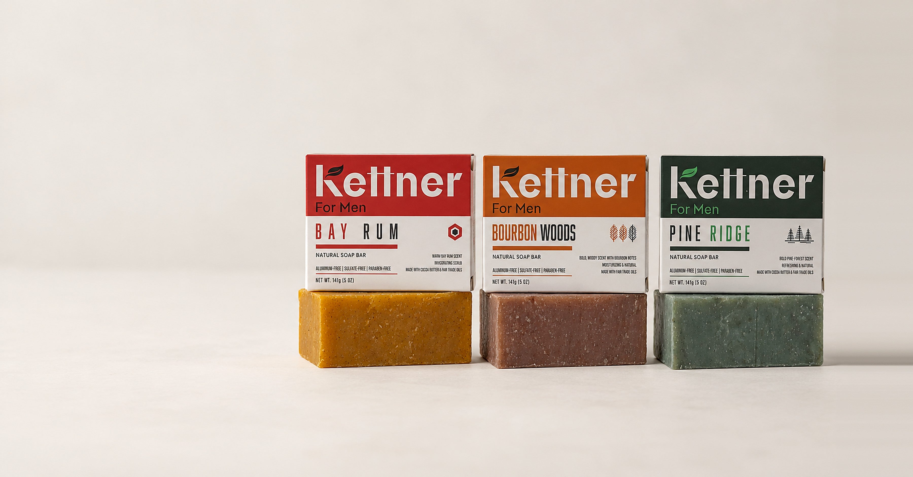 Kettner For Men Bay Rum, Bourbon Woods and Pine Ridge soap boxes, each standing on its bar